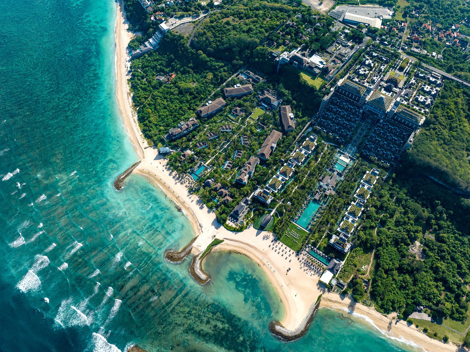 Stunning access-controlled luxury beachfront hotels dot the coast, including the Apurva Kempinski, where the G20 meetings were held in 2022.