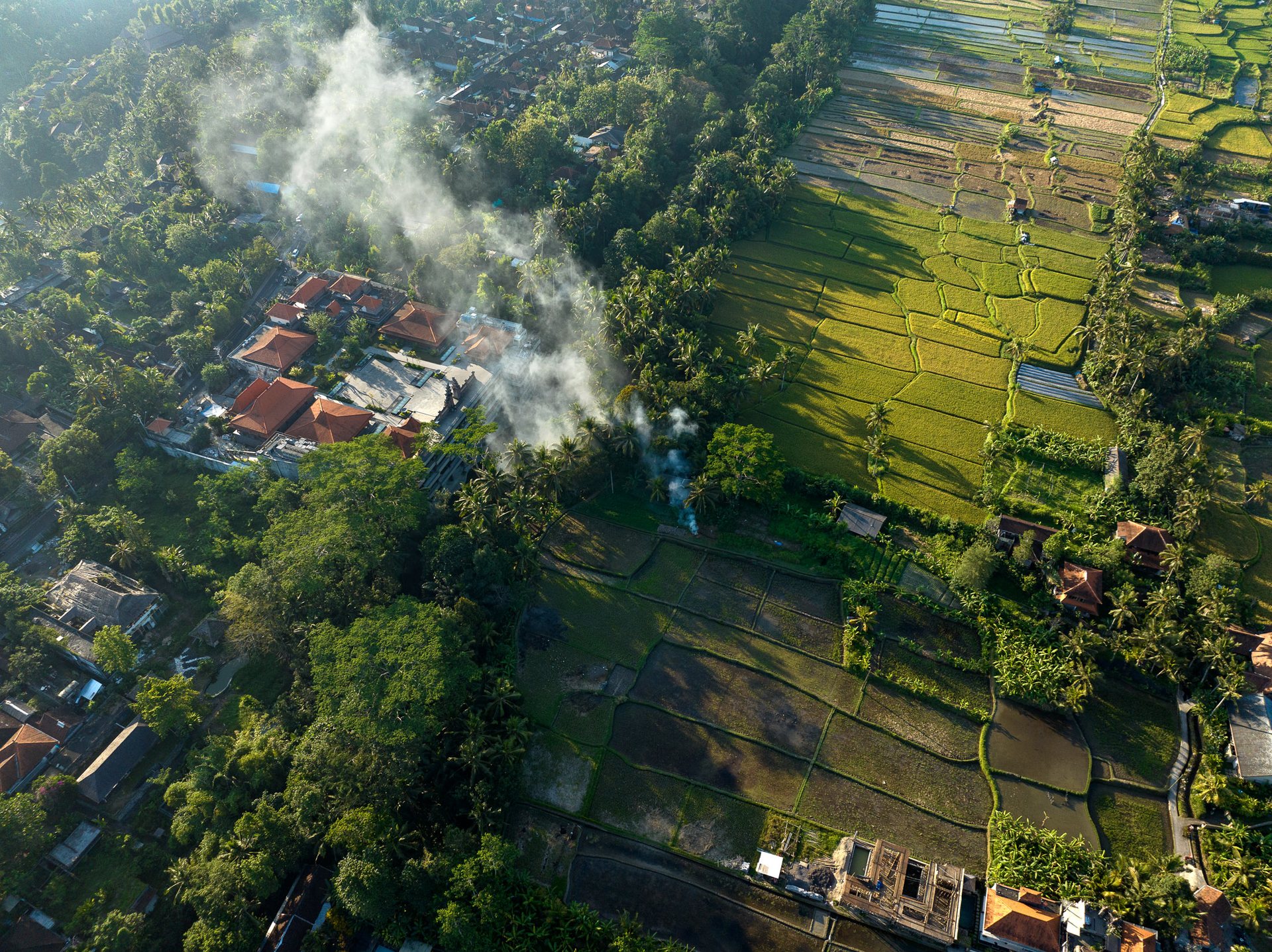 Aerial photograph of inequality in Bali, Indonesia by Johnny Miller