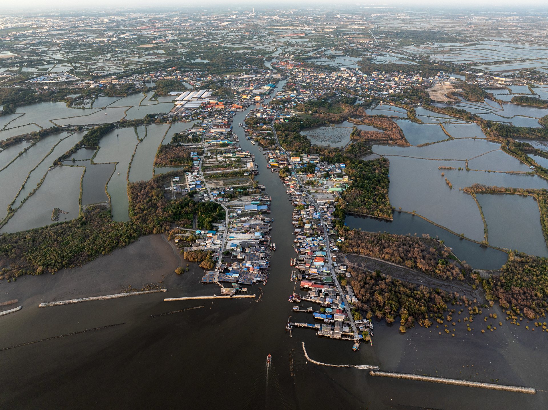 Climate change and sea level rise is predicted to radically reshape the urban landscape along Bangkok's coast.