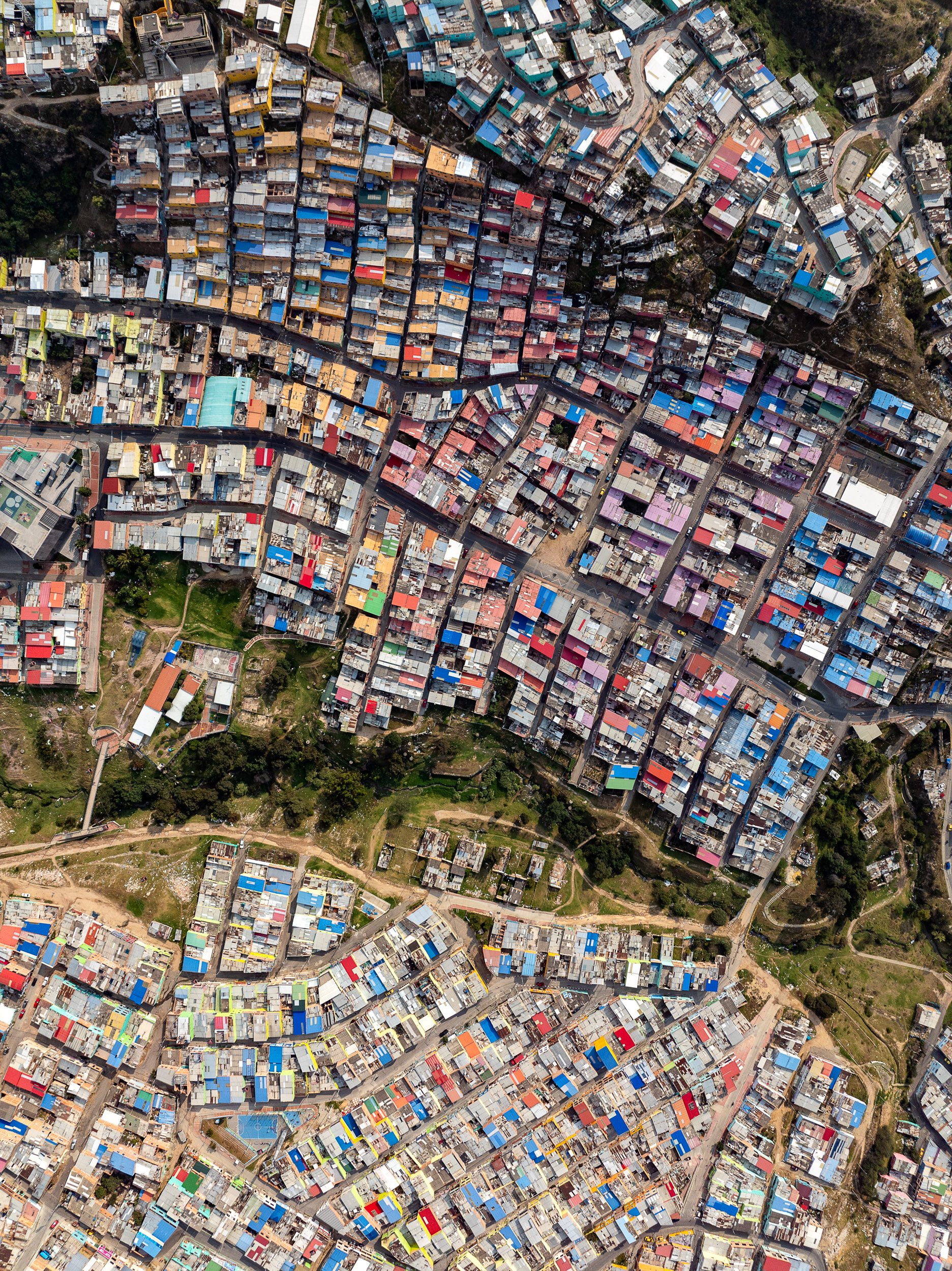 Extreme inequality between neighborhoods representing Strata 6 and 1 in Bogotá's richer suburbs.