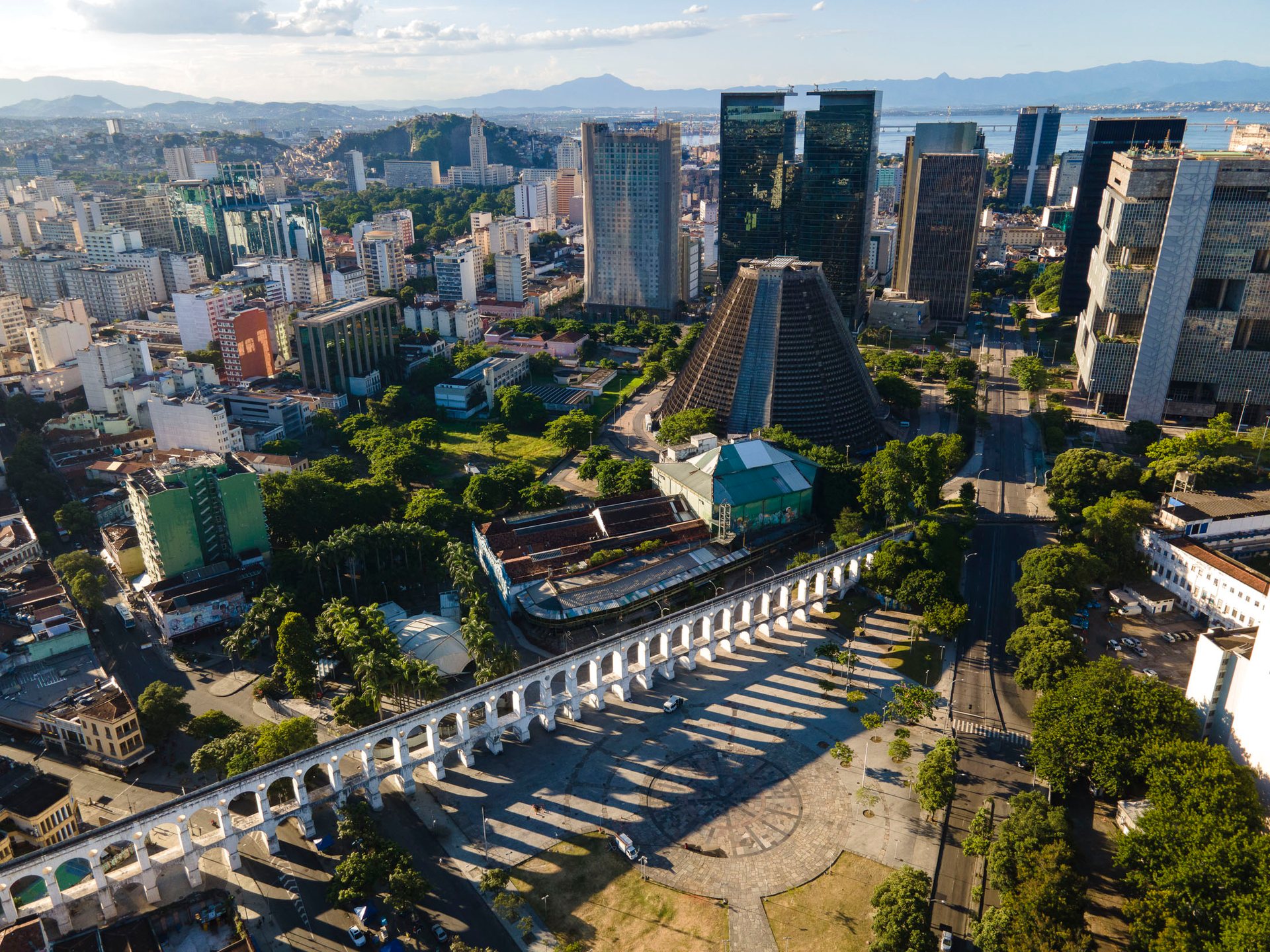Aerial view of Lapa’s iconic arches and financial district in Rio de Janeiro, Brazil.