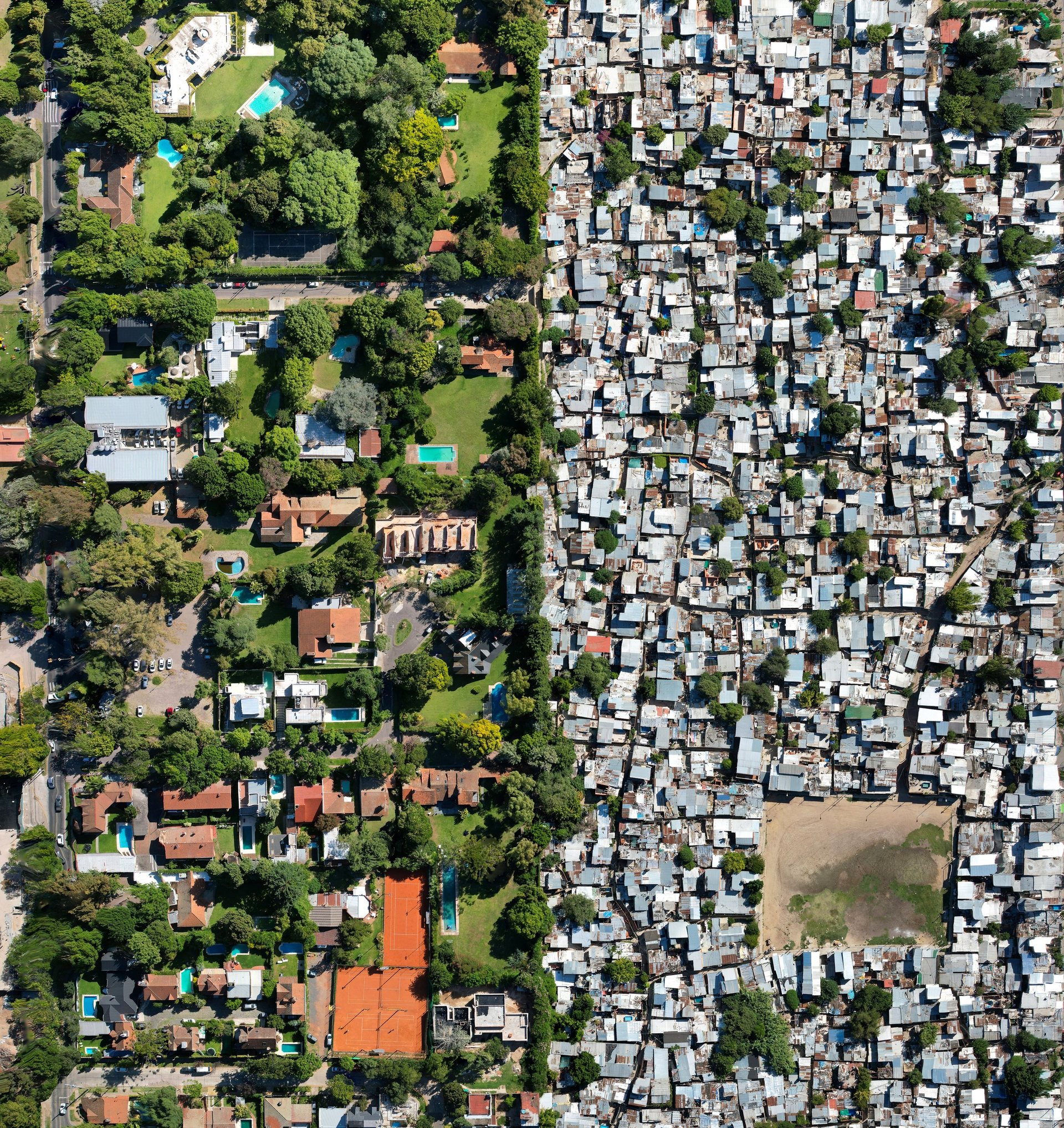 In Buenos Aires, wealthy neighbourhoods sit hard against the informal settlements known as villas miserias.