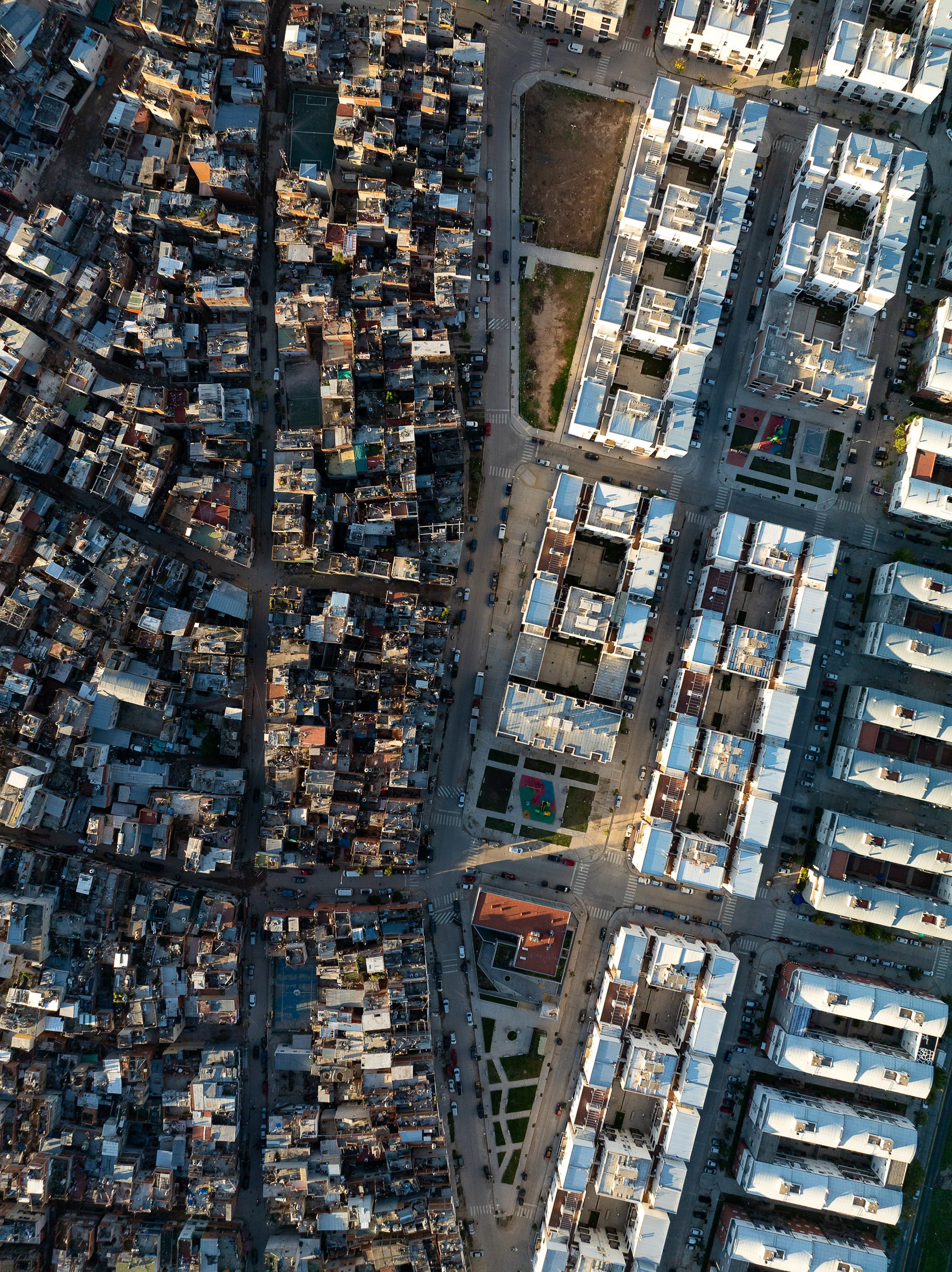 Swimming pools and fences delineate the suburbs into rich and poor in BA province, north of the city.