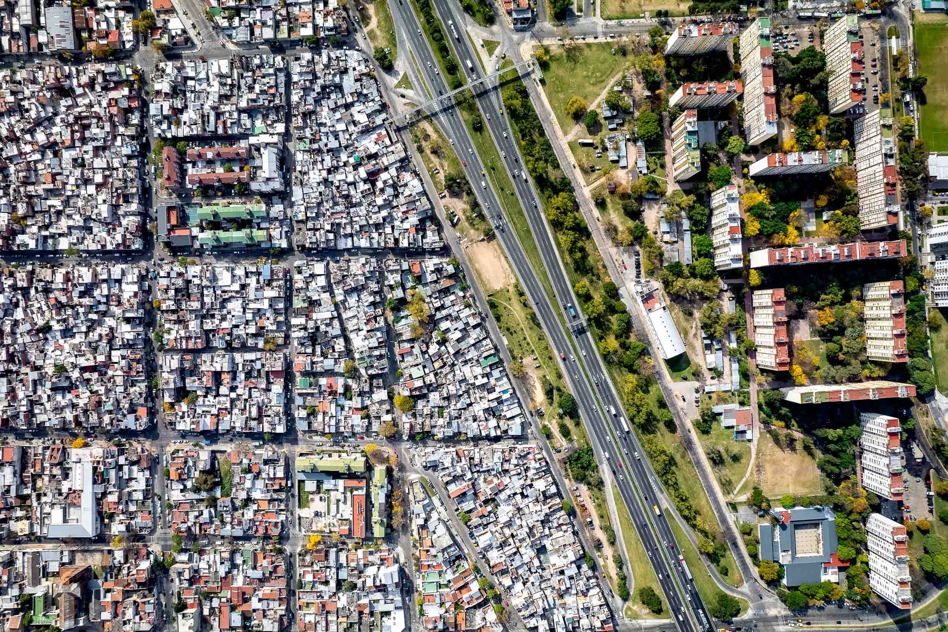 Swimming pools and fences delineate the suburbs into rich and poor in BA province, north of the city.