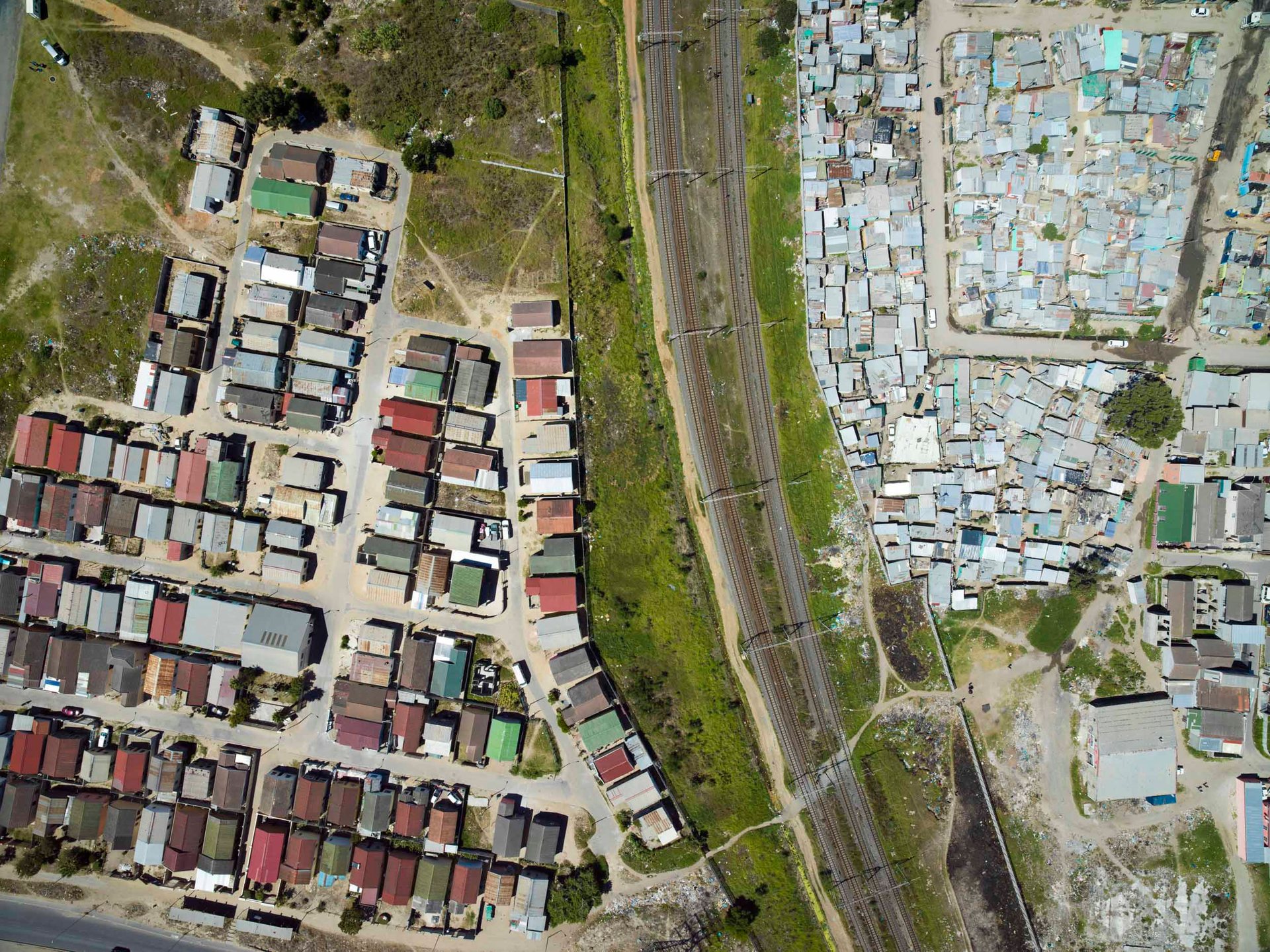 A checkerboard pattern of inequality near Somerset West, with the former "black spot" of Nomzamo and several informal areas visible, about