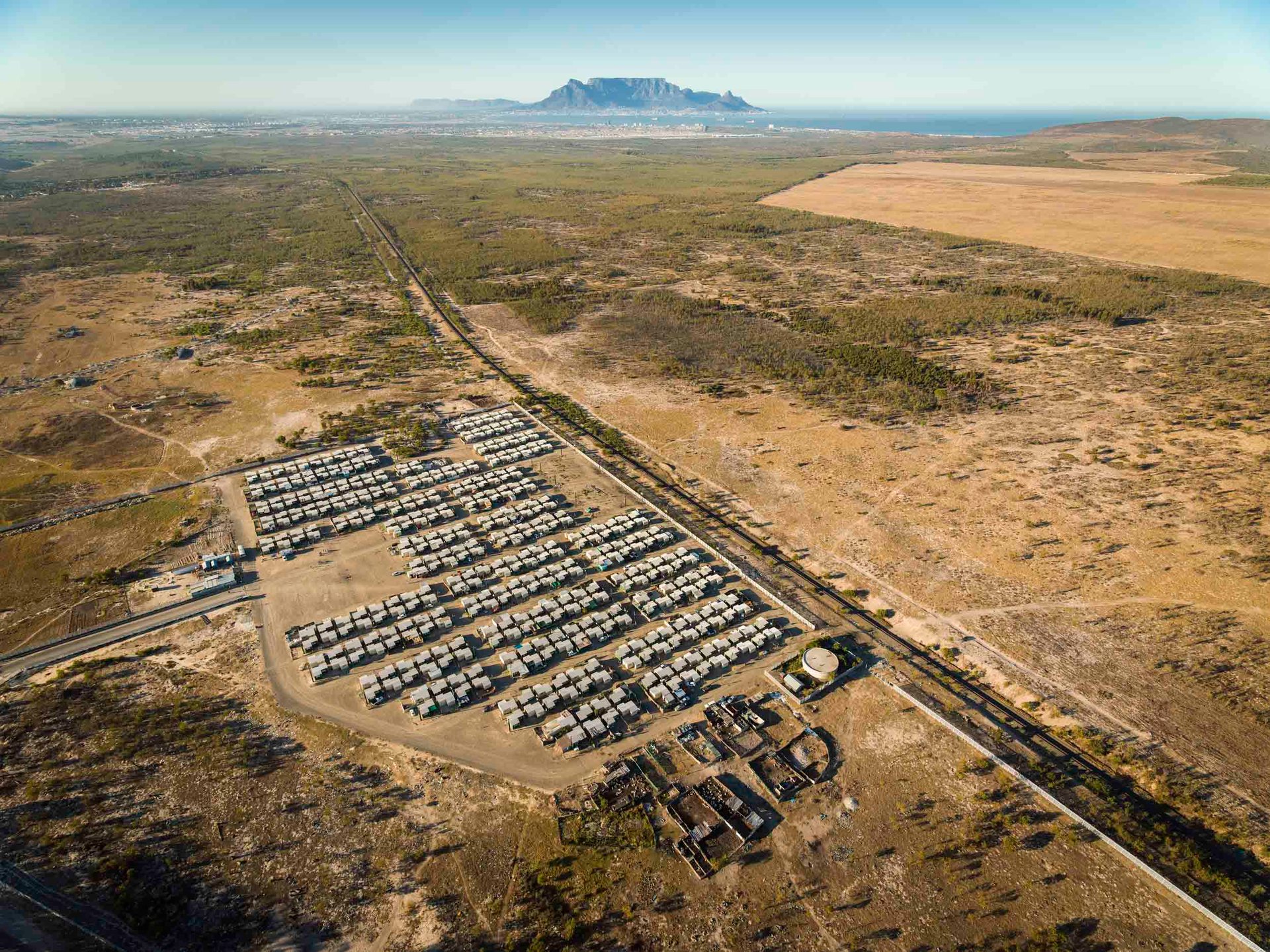 Shacks and the MyCiti bus yard along the N7 north of Cape Town.