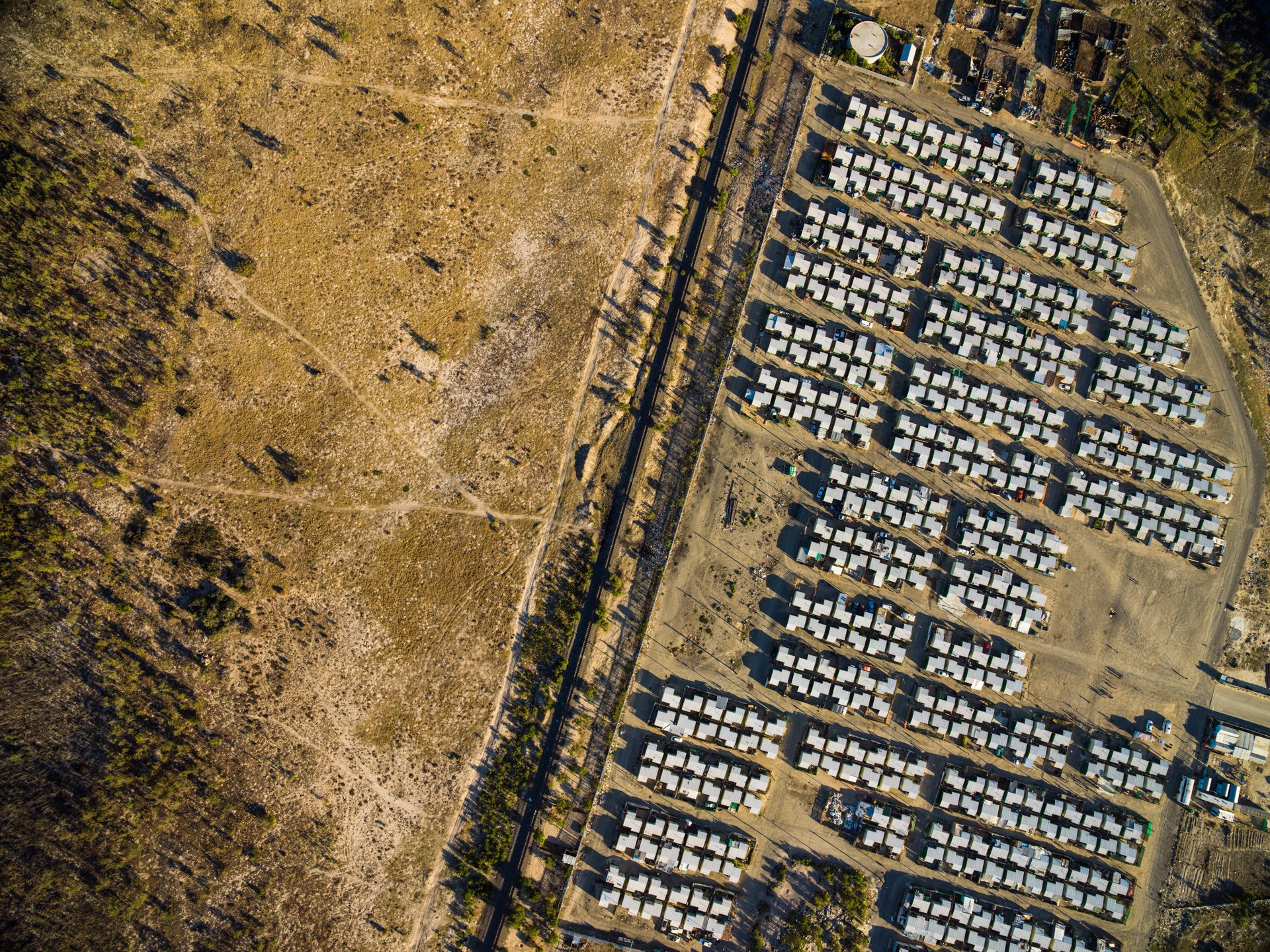 Dunoon, on Cape Town's northern edge, floods almost every winter, and the cause is as much structural as meteorological.