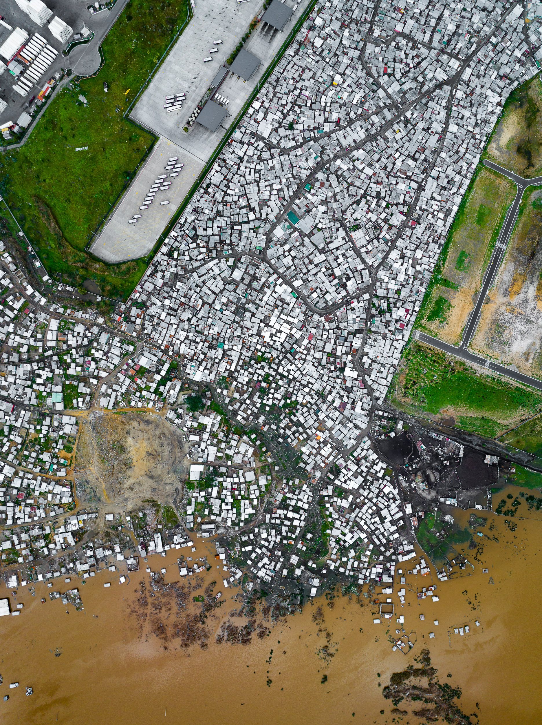 Dunoon, on Cape Town's northern edge, floods almost every winter, and the cause is as much structural as meteorological.