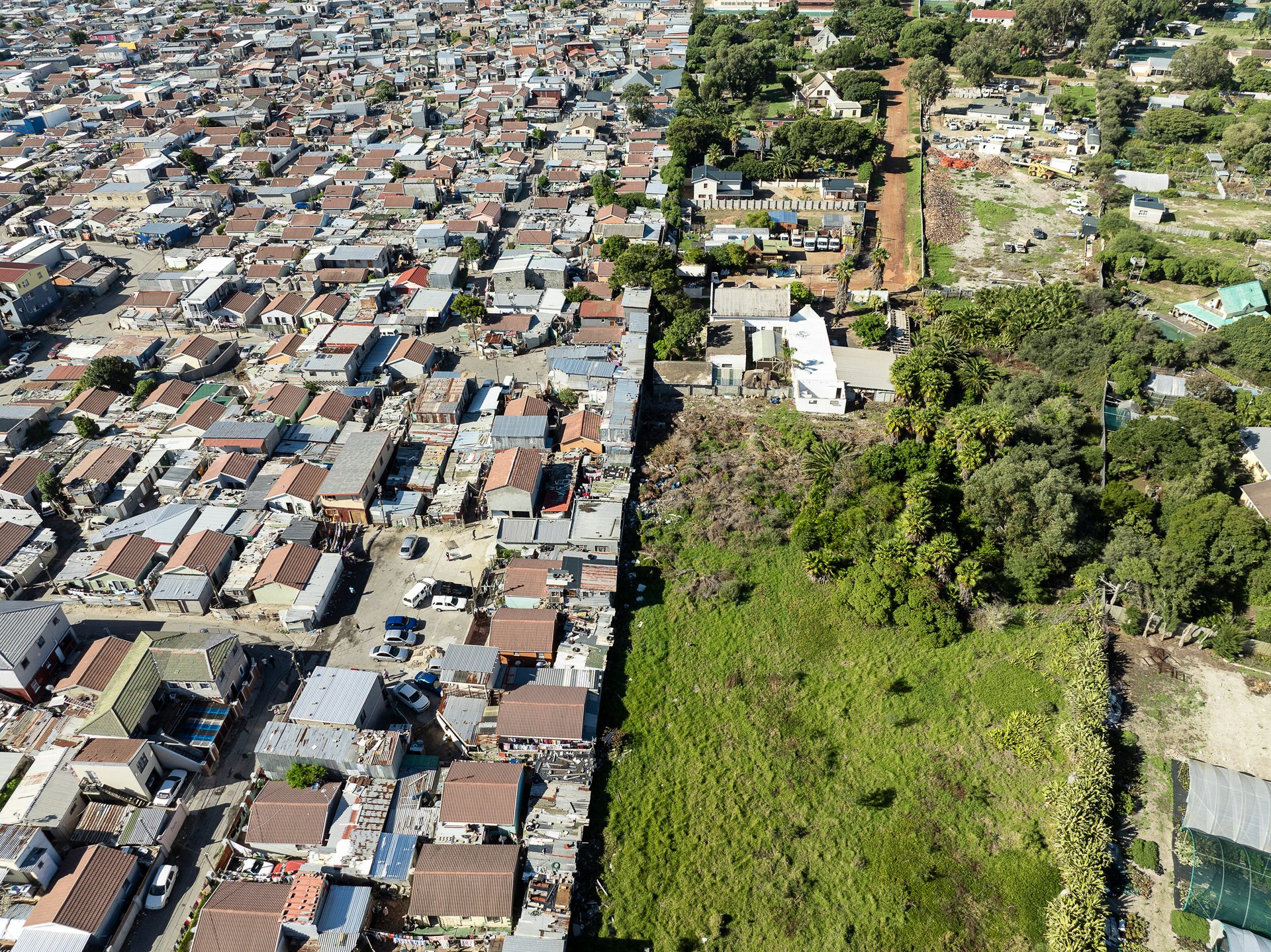 Aerial photograph of inequality in Cape Town, South Africa by Johnny Miller