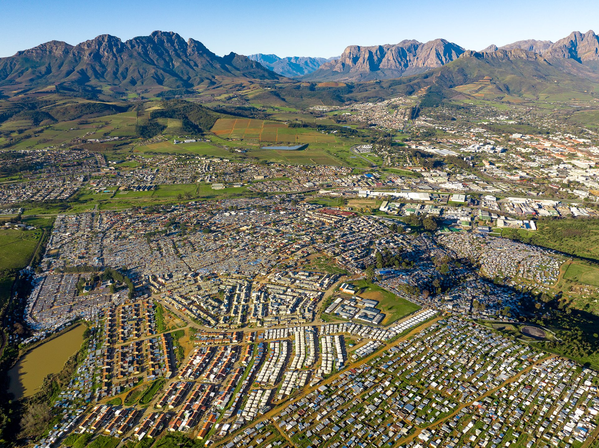 In a stunning display of contrast, Kayamandi sits at the top of a hill overlooking one of the most beautiful winelands in the world, those