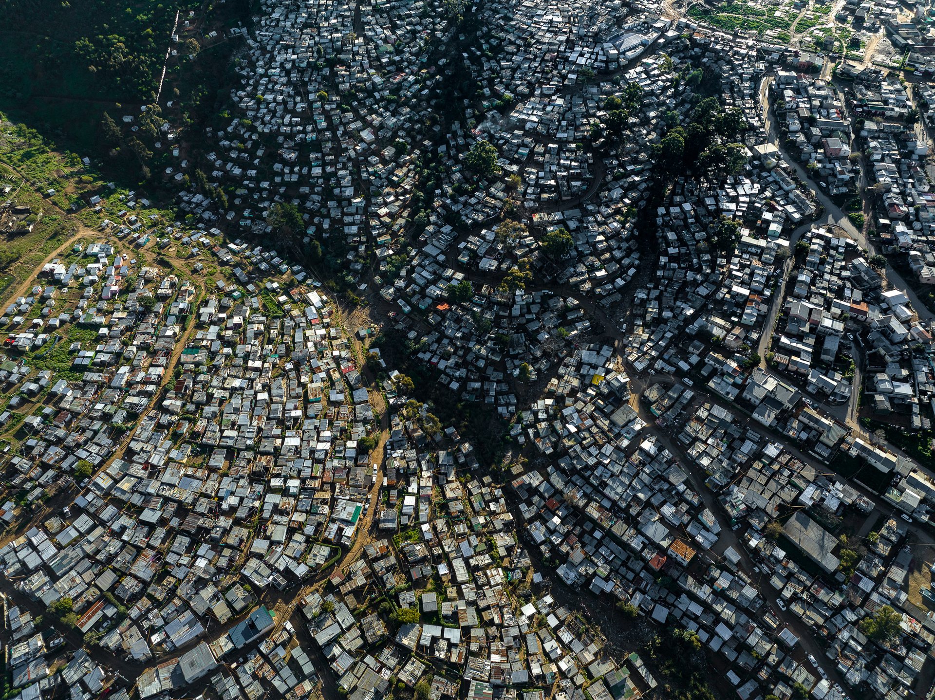 The contrast in Kayamandi is a gap of extreme wealth disparity, but also a blight hidden in plain sight to the thousands of tourists and