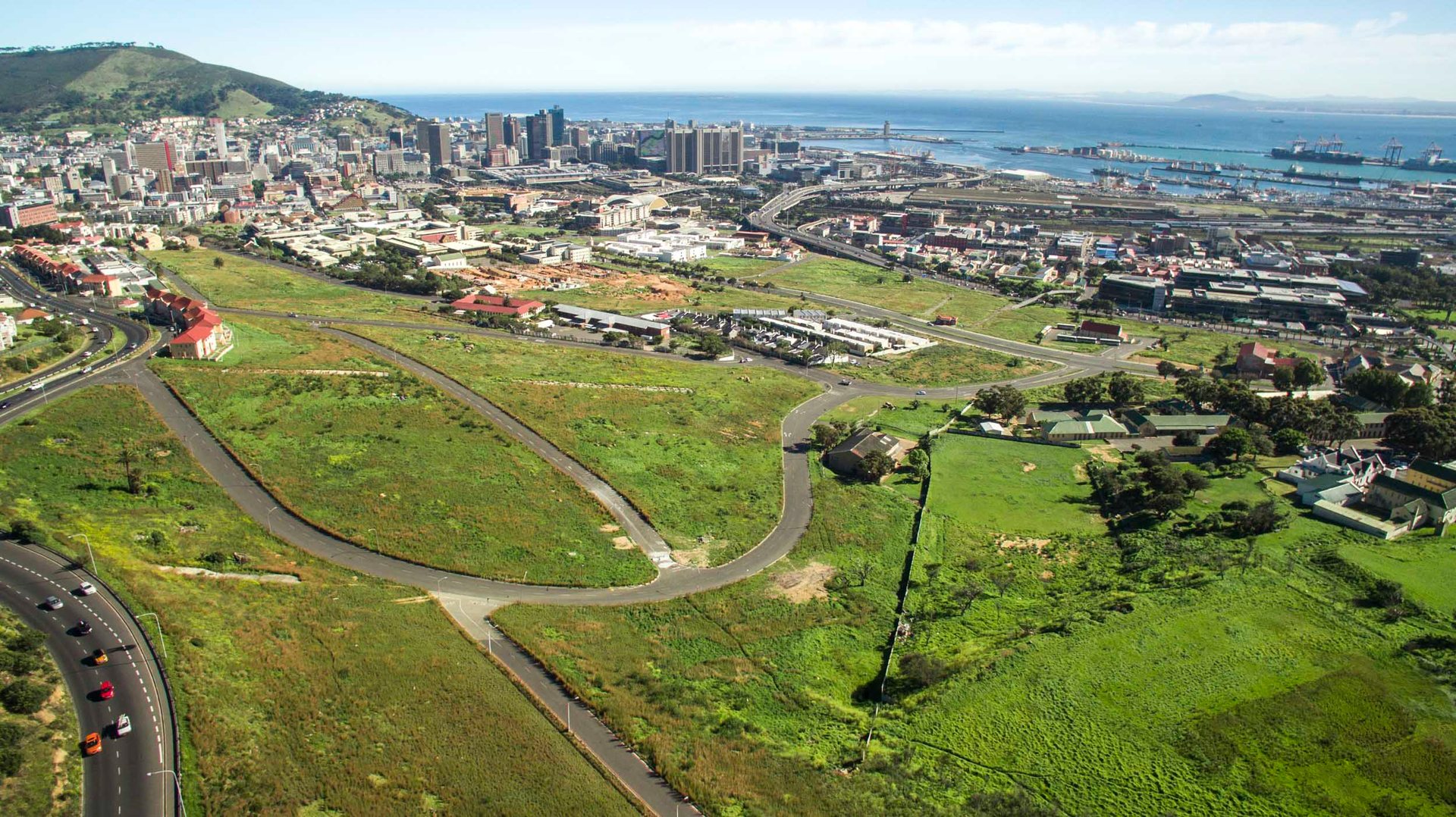 District Six still exists as a series of empty lots, piles of rubble, and the skeleton of city streets only partially visible amongst the