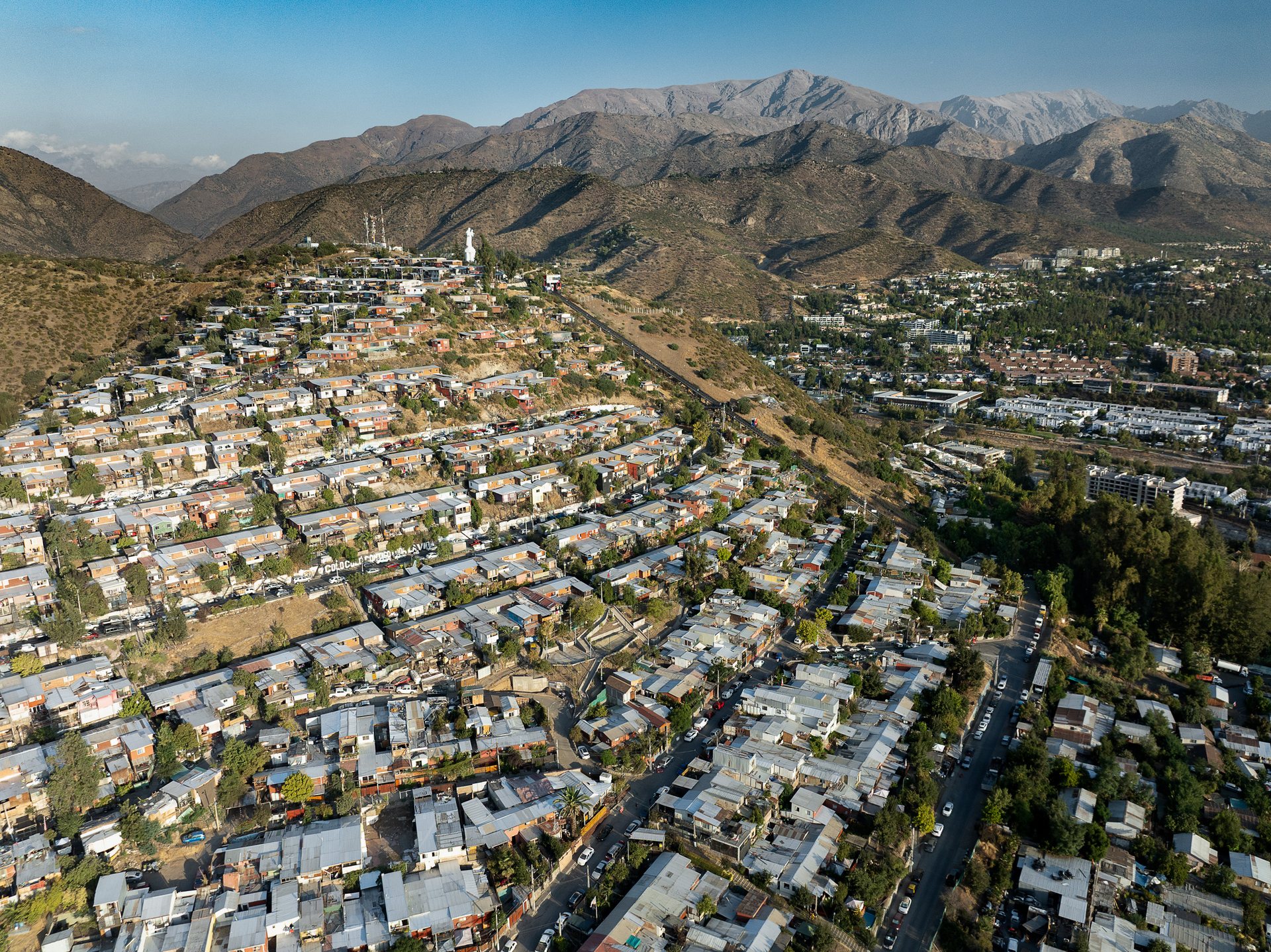 The neighborhood of Lo Barnechea is one of the wealthiest parts of Santiago, but also comprises this poor suburb which takes up all of