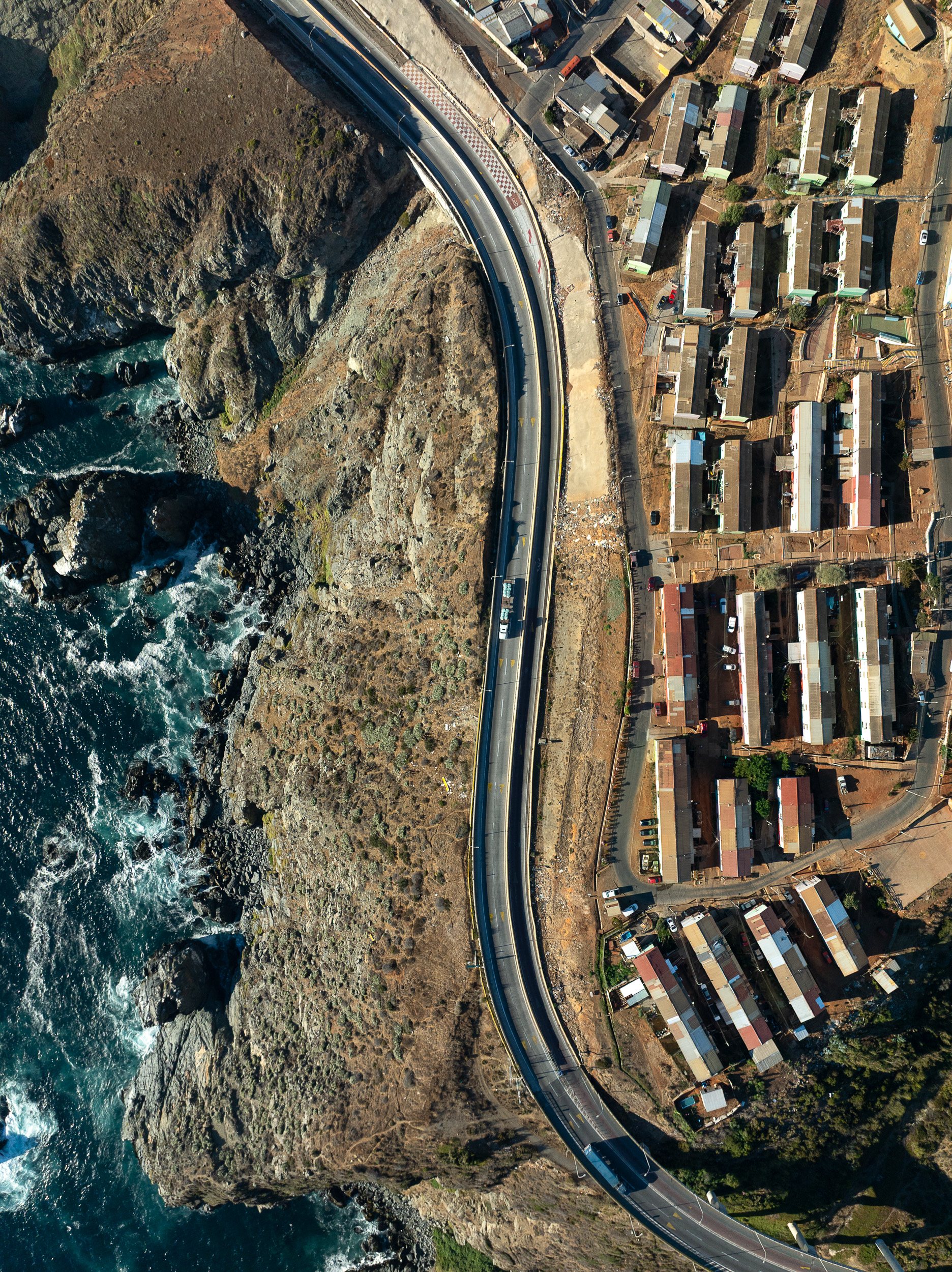 Housing perched on the edge of the Pacific Ocean in Valparaiso.