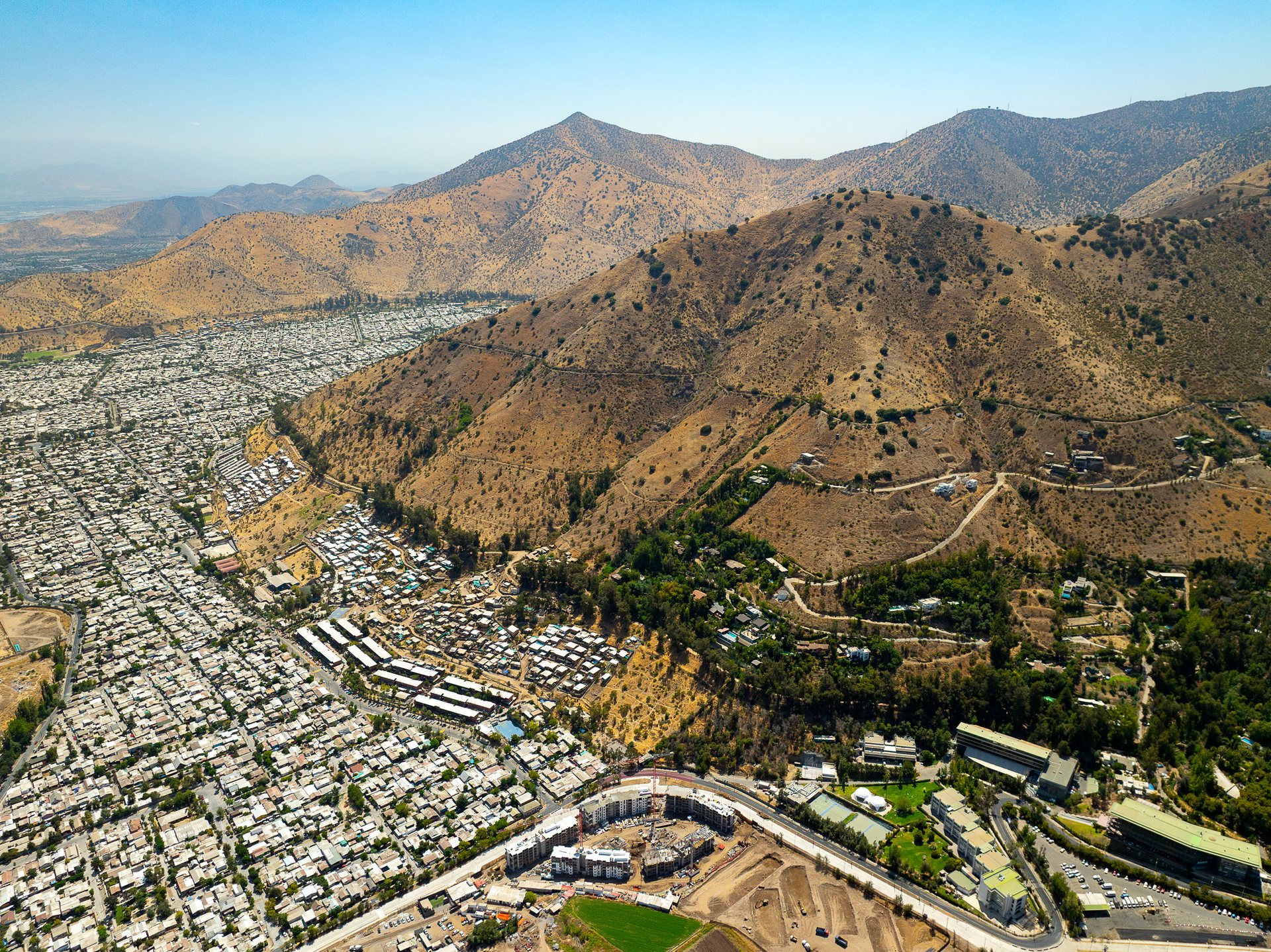 Cerro San Cristobal separates poorer neighborhoods like this one from the wealthy parts of downtown Santiago.