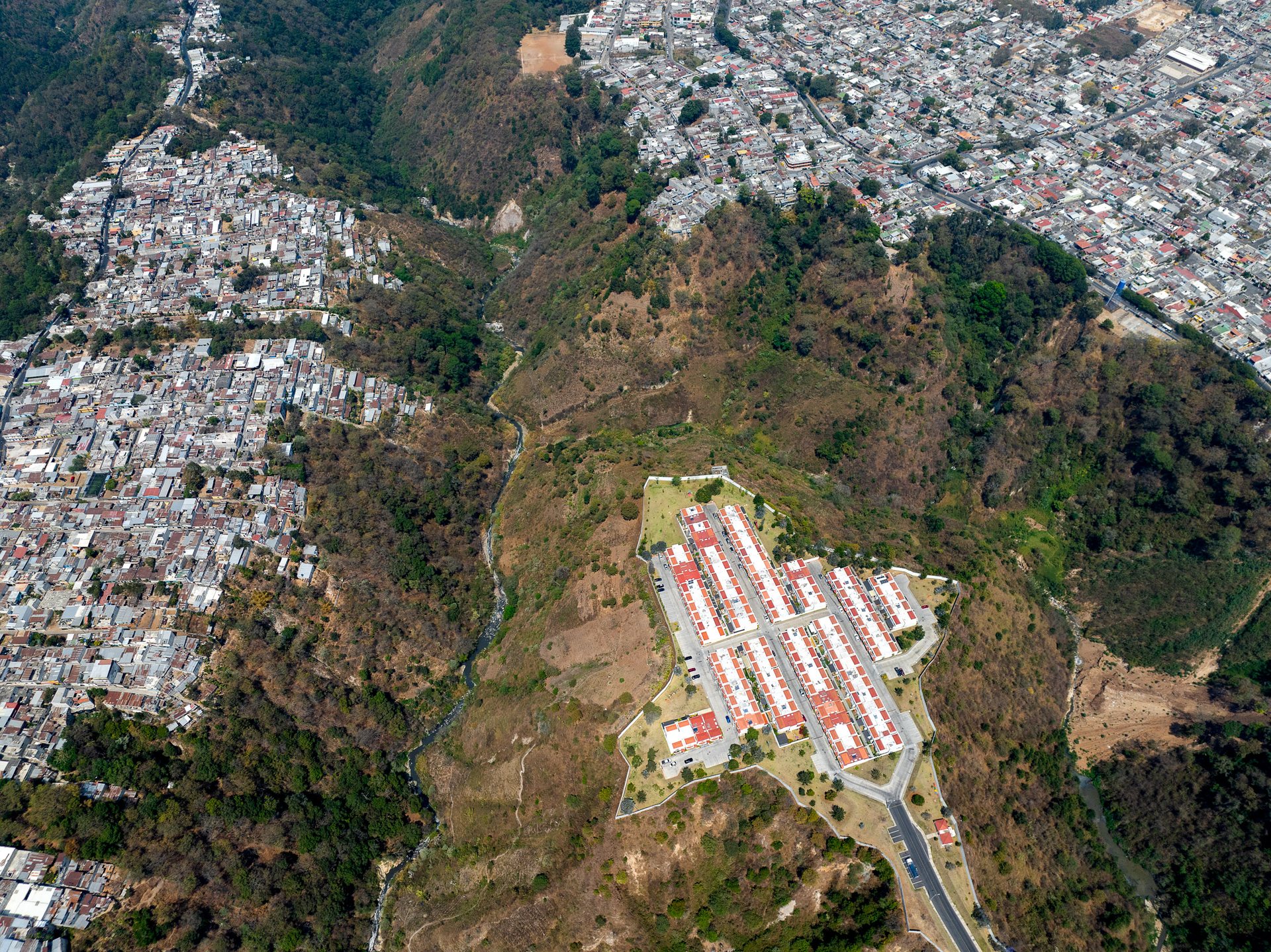 Guatemala City's topography lends itself to building on top of ridges, which are protected by deep ravines.