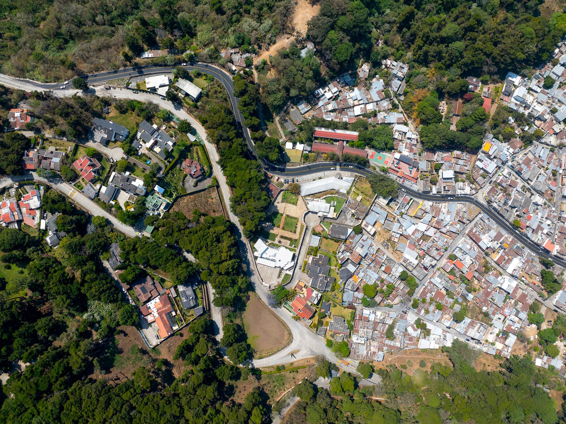Sprawling development along the volcanic ridges to the west of the city.