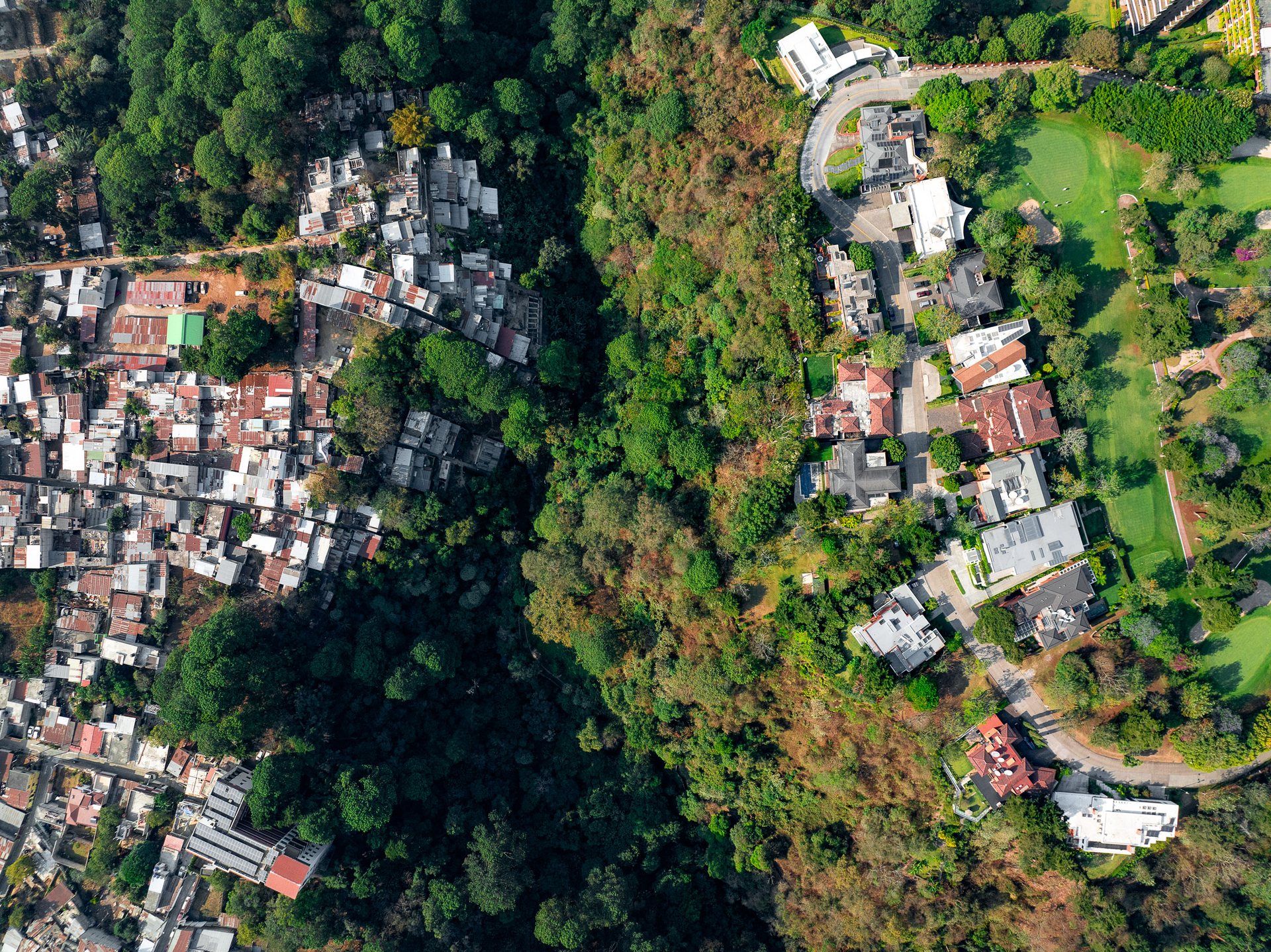 Informal homes next to a golf estate, San Isidro.