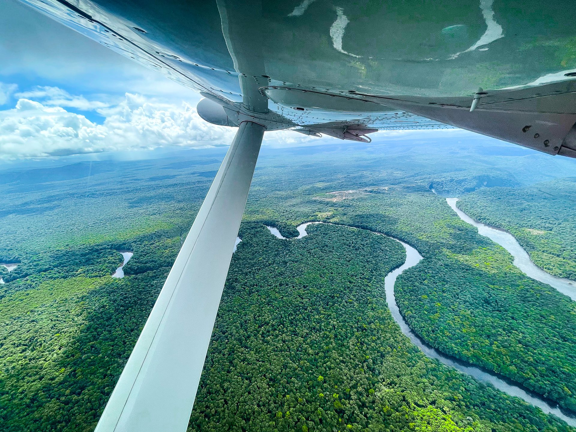 Flying out of Kaiteur Falls, said to be the highest-volume single-drop waterfall in the world, reveals the extent to which Guyana is covered in virgin, almost impenetrable Amazon rainforest.