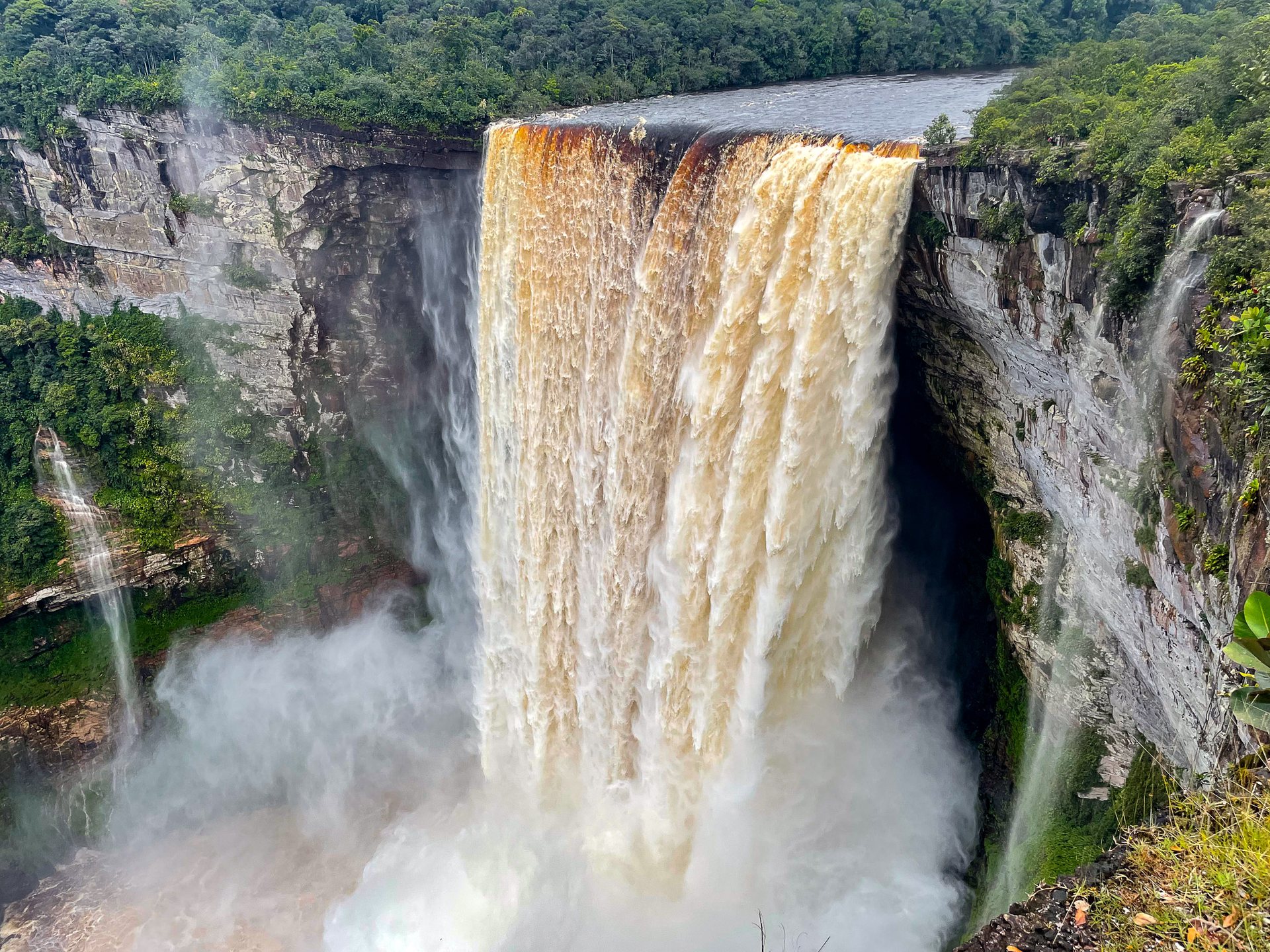 Kaiteur Falls, the world's highest-volume , single-drop waterfall in the world, in the middle of the rainforest, accessible only by air.