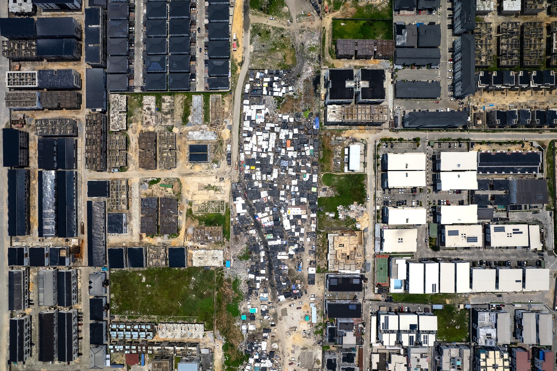 Informal settlements pop up anywhere there's a void in the city's formal housing fabric.