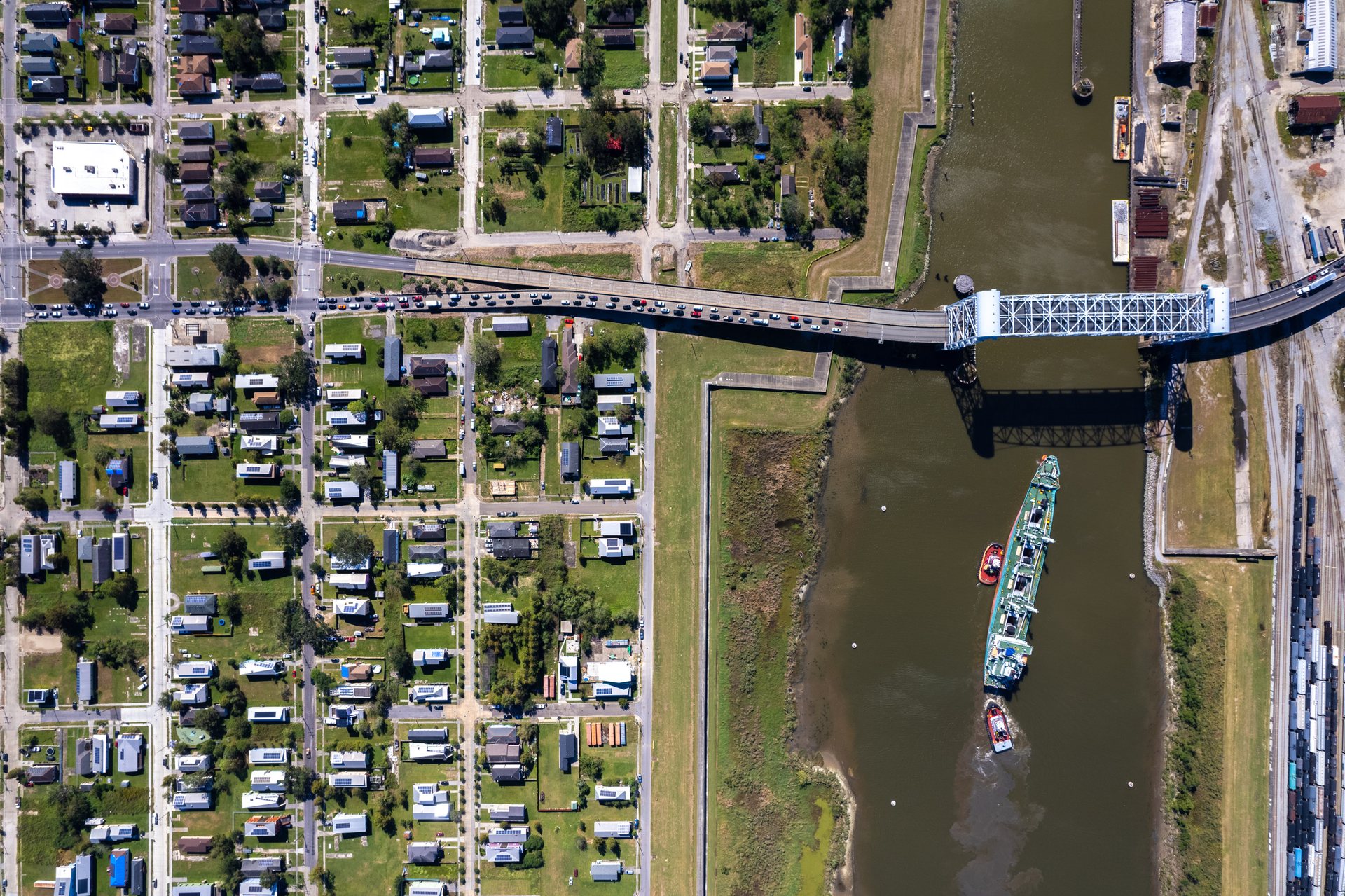 The Lower Ninth Ward of New Orleans sits below sea level, ringed by levees and canal floodwalls.