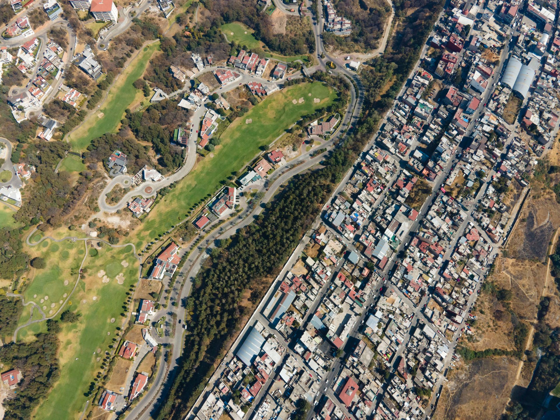 A golf course in the foothills of the mountains, at 2500m altitude.