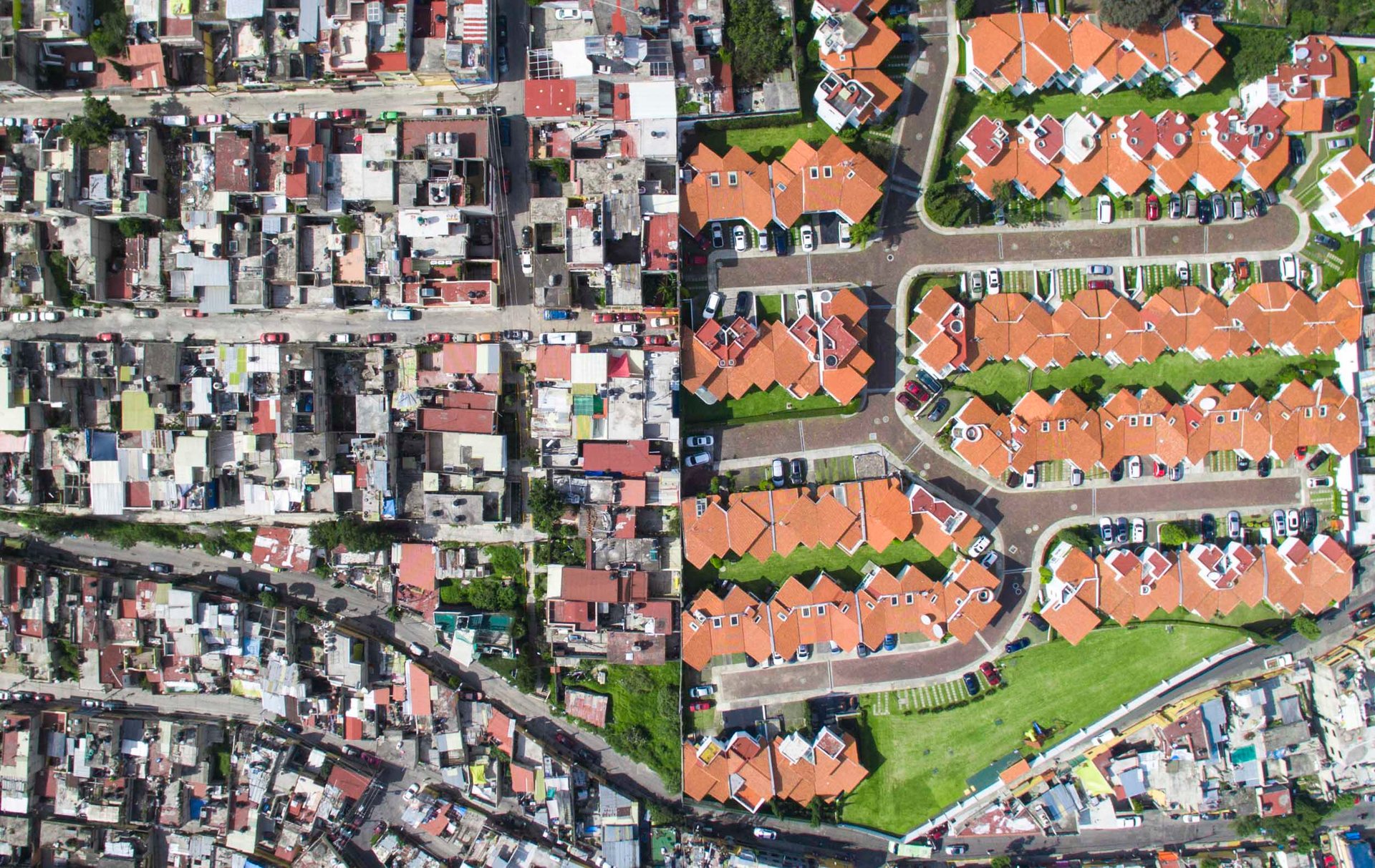 In Santa Fe, land is at such a premium that developers have begun to carve out housing estates from the surrounding slum areas.