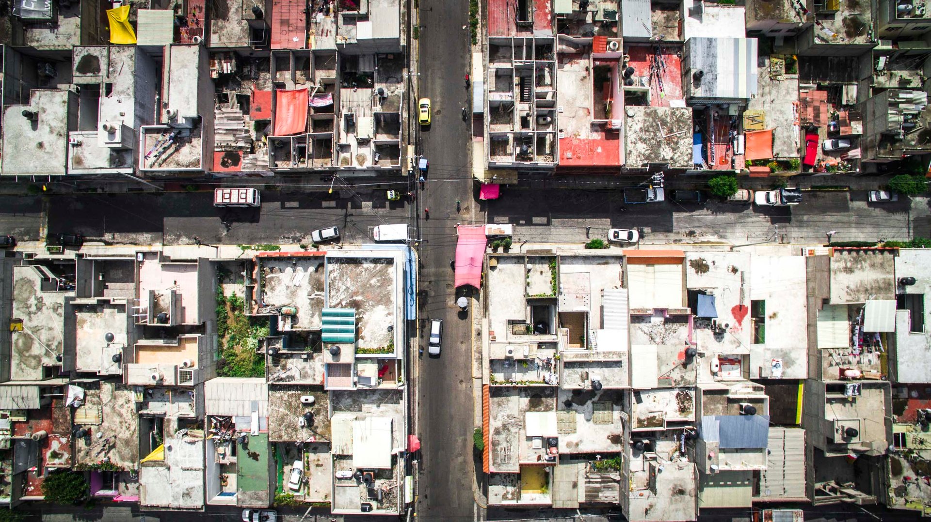 From above, the city grid of Ciudad Nezahualcoyotl (Neza) looks like an endless series of Christian crosses.