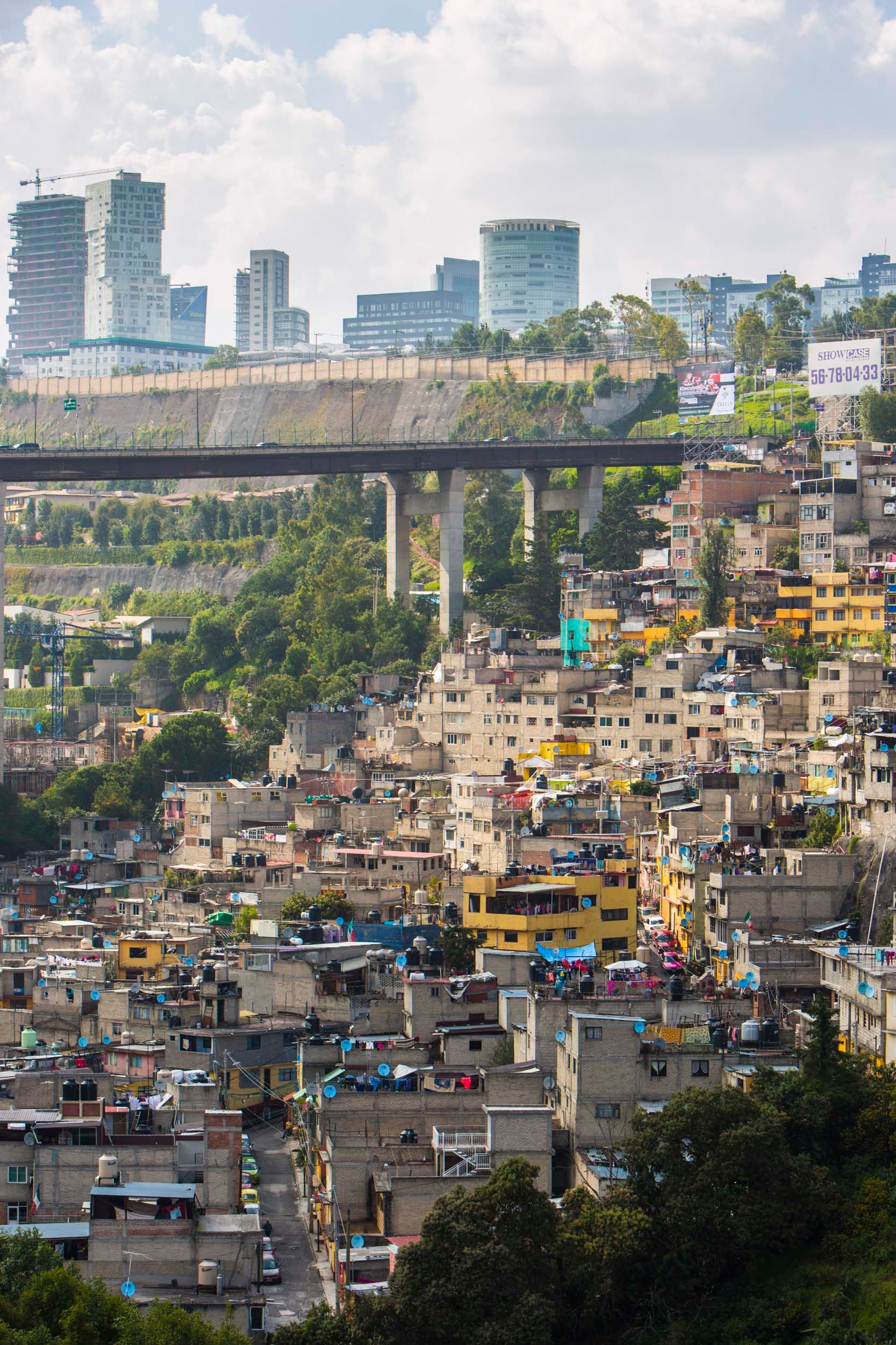 Barrios extend from the bottom to the top of a ravine in Mexico City's Santa Fe neighborhood.