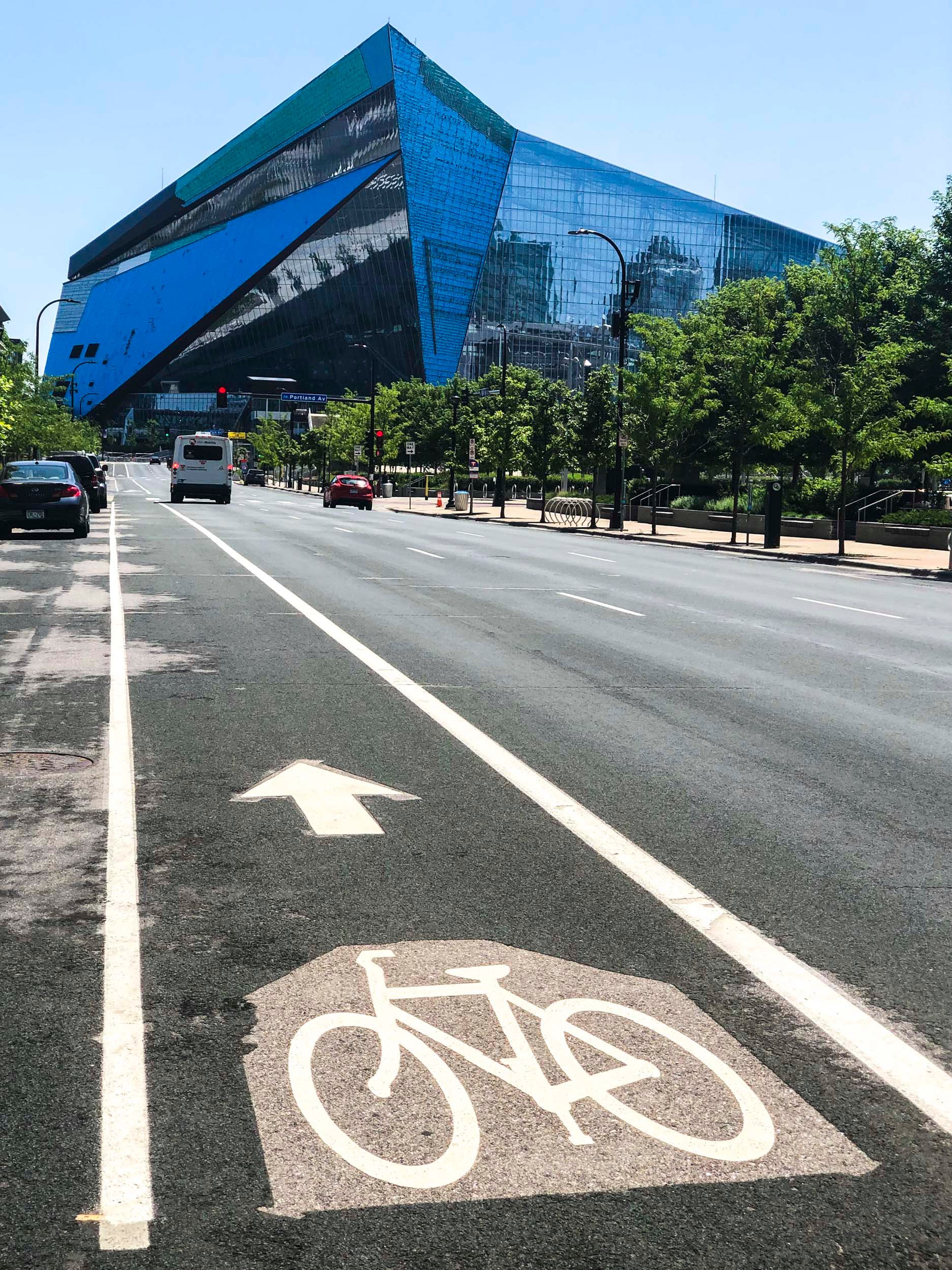 Bike paths and gleaming new sports arenas belie the many problems that face Minneapolis.