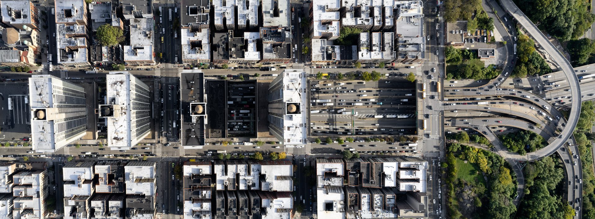 The four tower blocks straddling the highway here are the Bridge Apartments, built in the early 1960s directly above the Trans-Manhattan Expressway, the stretch of Robert Moses's notorious Cross-Bronx corridor that runs to the George Washington Bridge.