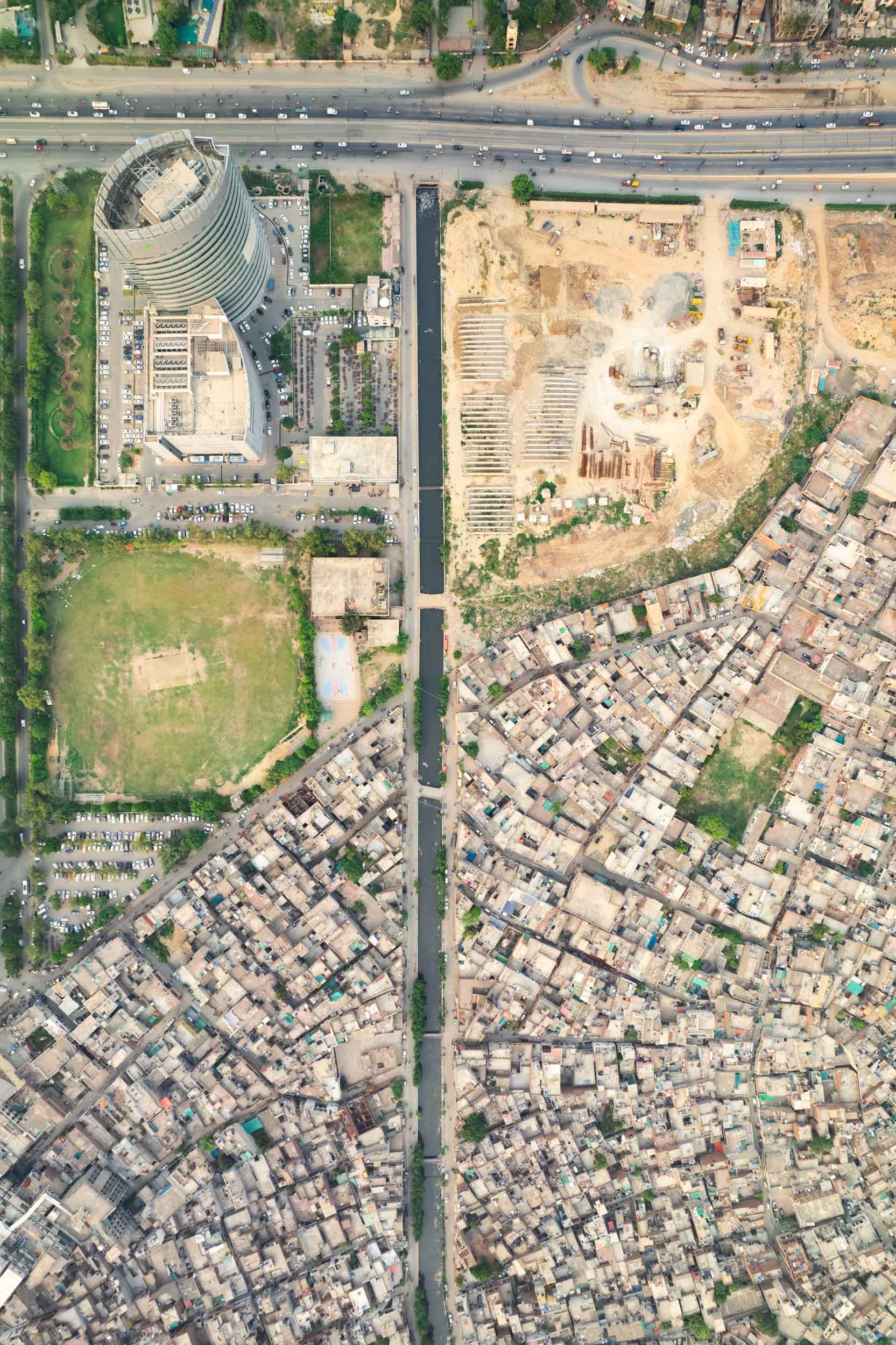 The Arfa Software Technology Park rises over Bahar Colony in Lahore.