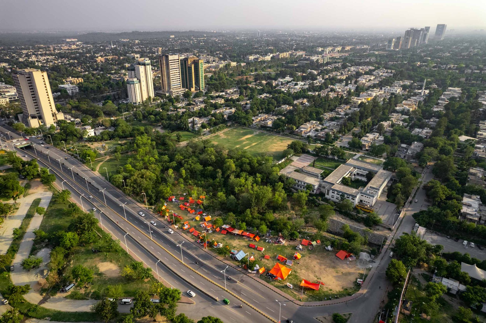 Afghan refugees, many of whom fled the Taliban in August 2021, live in tents in central Islamabad.