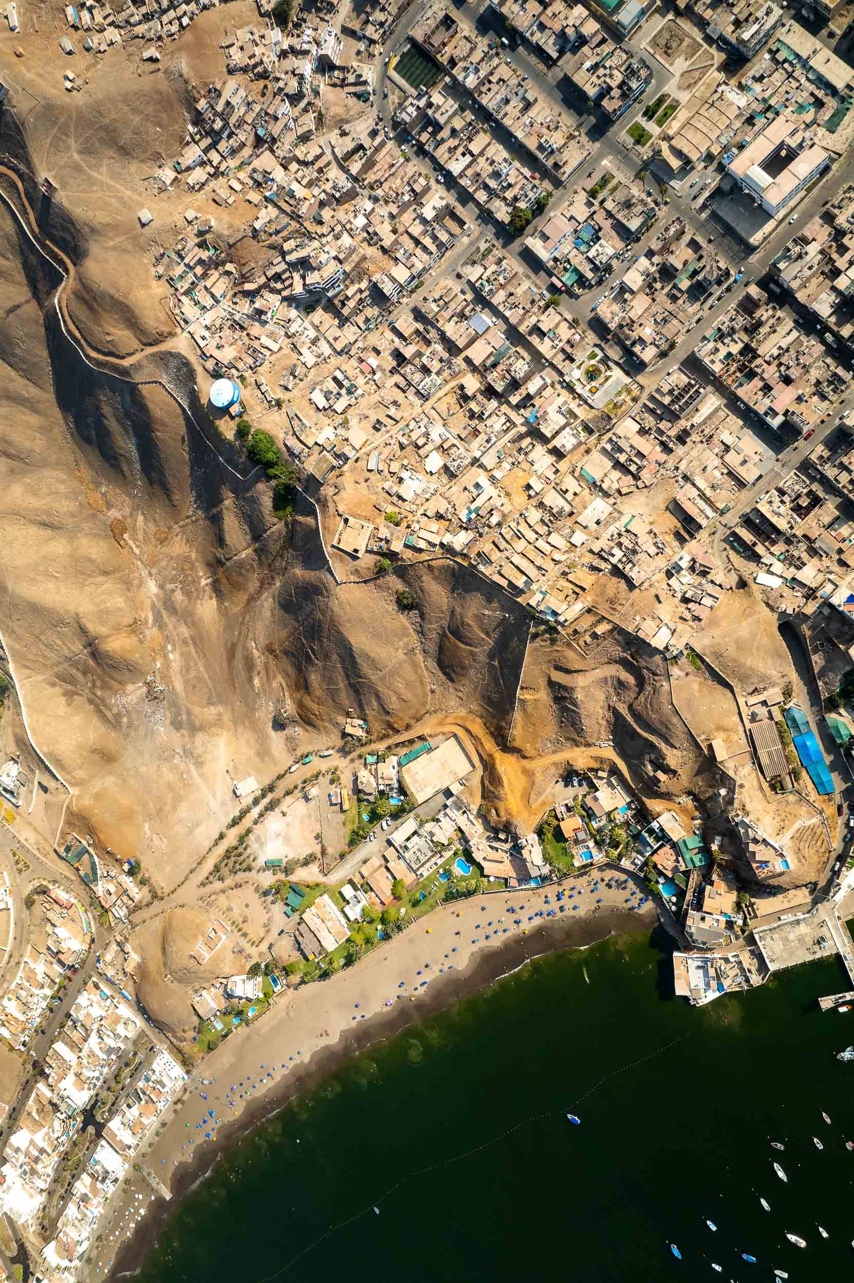 Pucusana, the southernmost district of metropolitan Lima, sits about an hour down the coast, a fishing town wedged between the Pacific and bare desert hills.