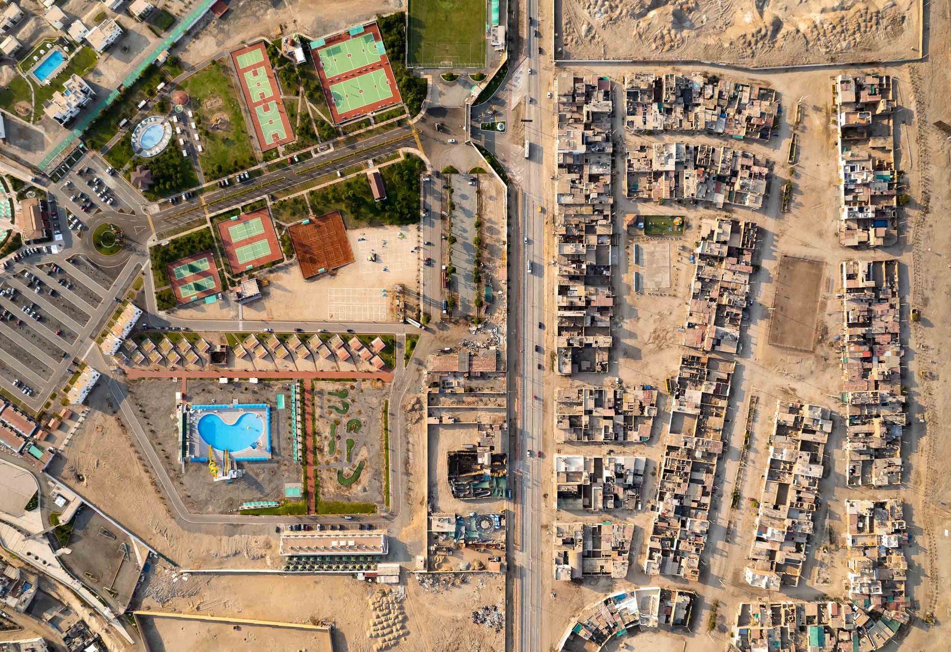Country Club El Bosque Sede Playa opposite the dusty communities of Punta Negra, south of Lima.