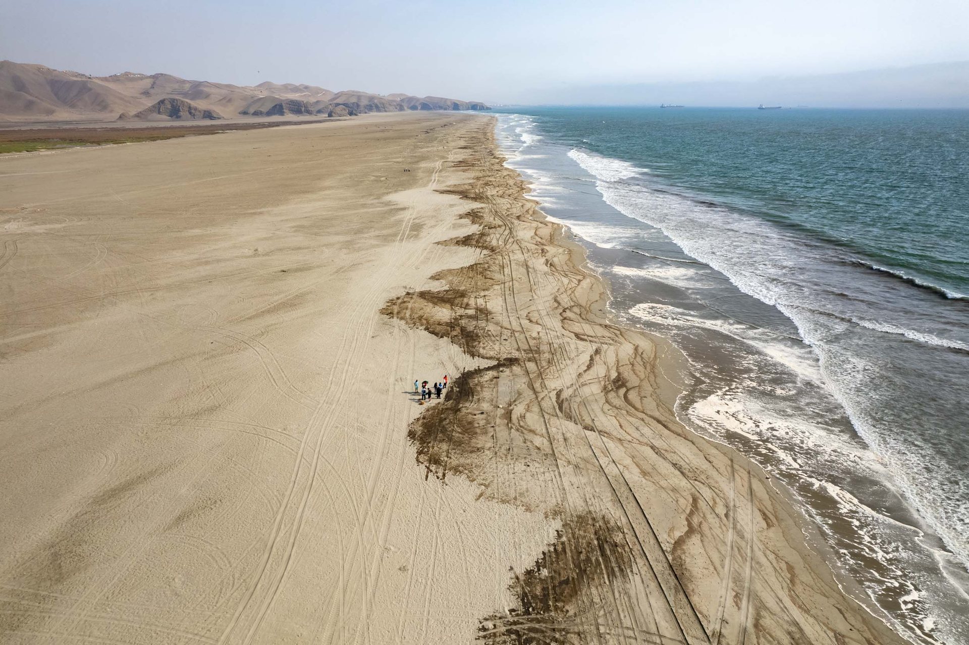 An oil spill coats the beach in Ventanilla, Peru on January 19, 2022.