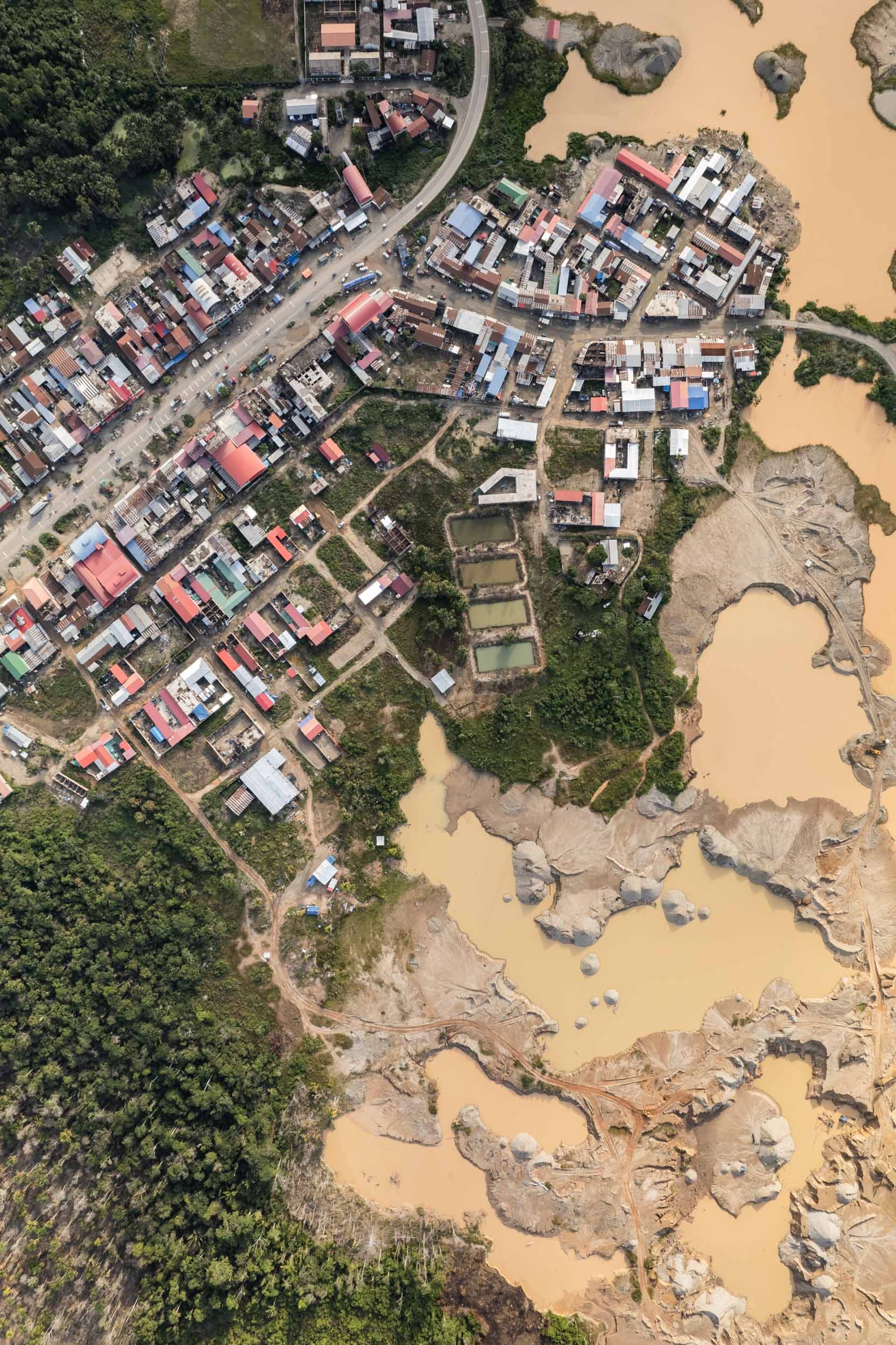 Nueva Arequipa, the boom town at the center of the devastated Madre De Dios gold mining region.