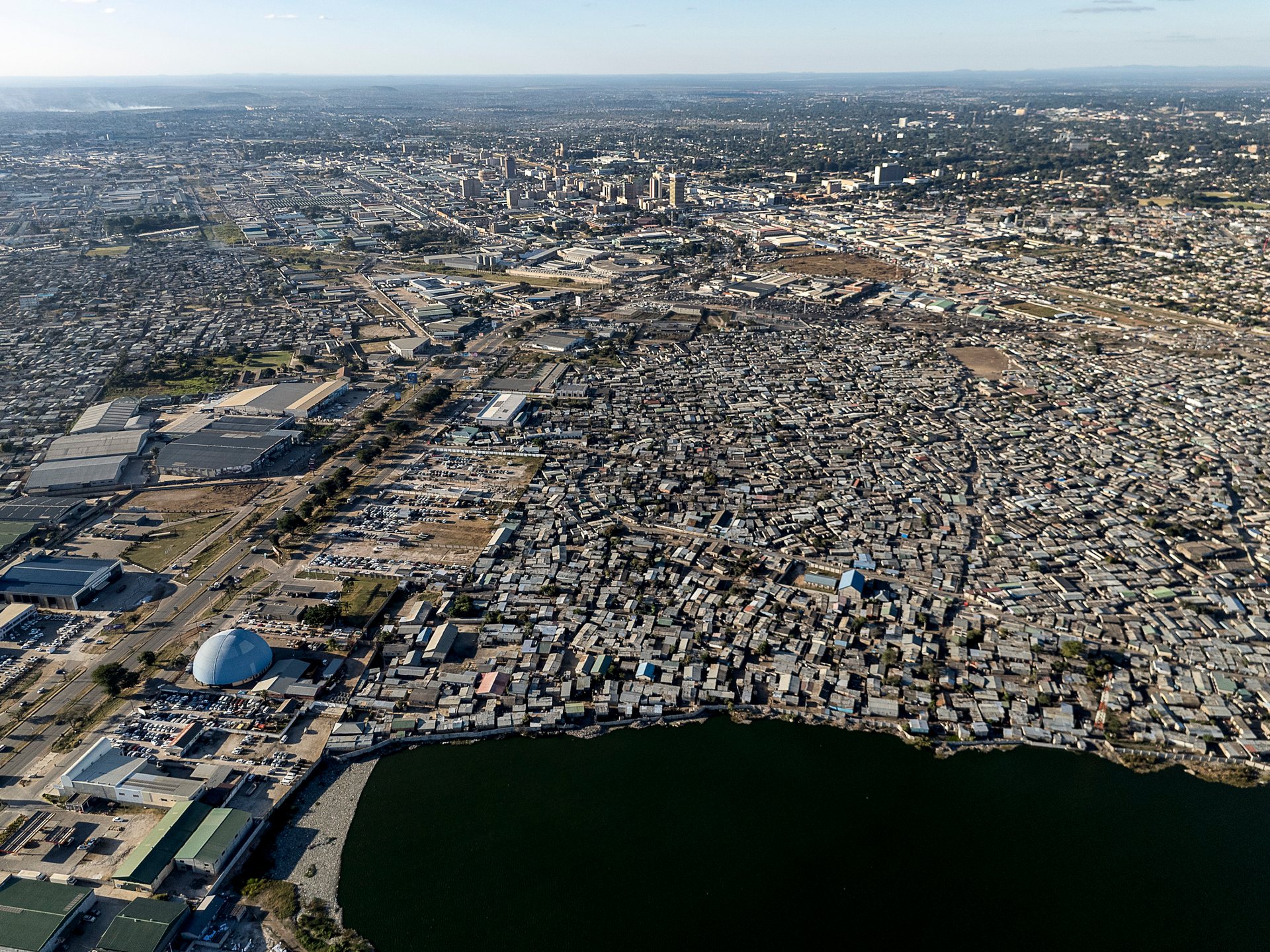 Downtown Lusaka as seen from above Msisi, the giant compound in the city's south.
